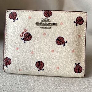 COACH SNAP CARD CASE WITH LADYBUG PRINT